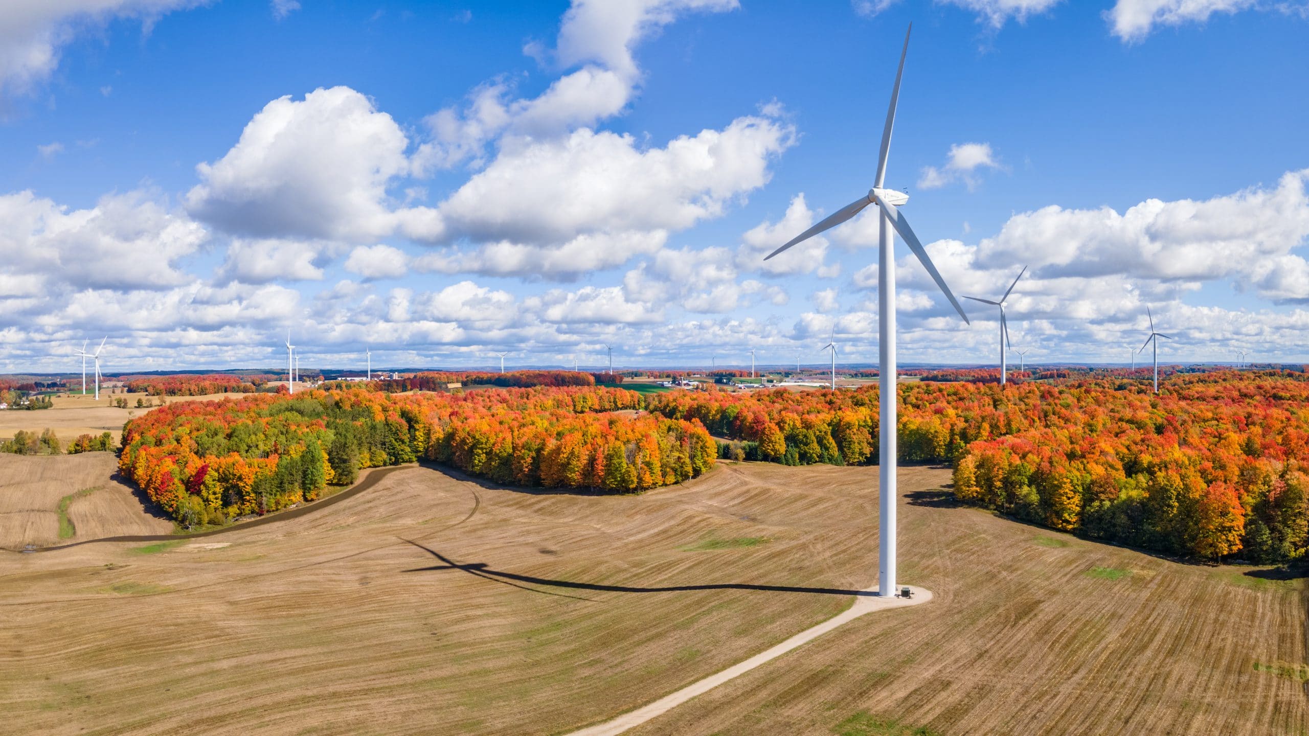 Autumn sunny day with wind turbines in central Michigan farmland near Cadillac Michigan